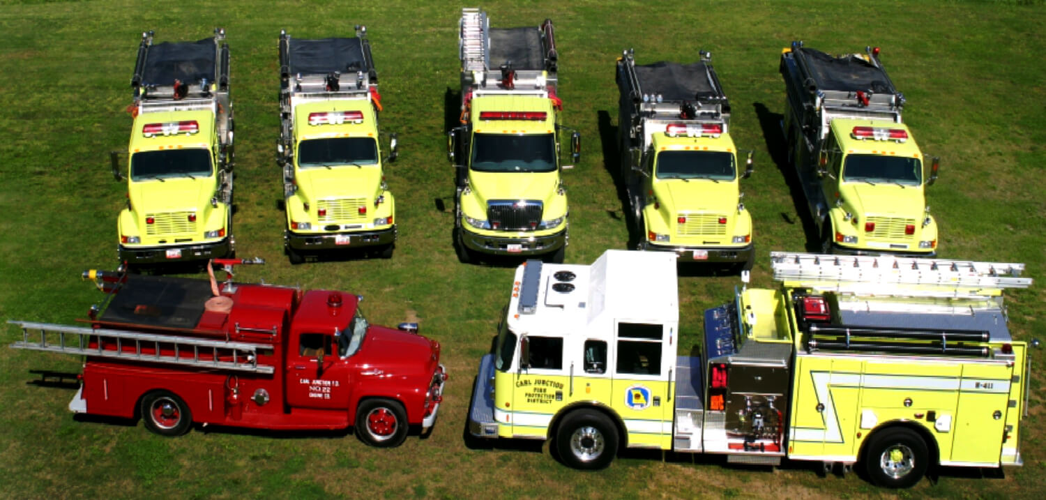 overhead photo of seven fire trucks